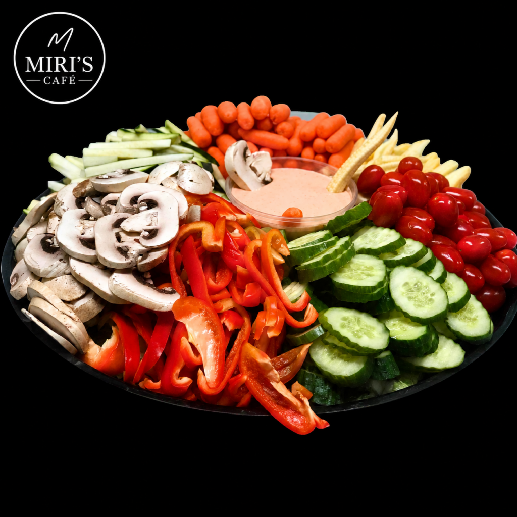 Kosher veggie platter with fresh vegetables and house dipping sauce from Miri's Cafe in Miami Beach